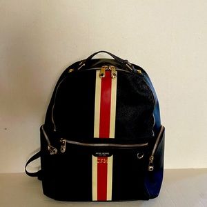 Henri Bendel Rare Black Backpack. Red and white stripe, stars on top.
